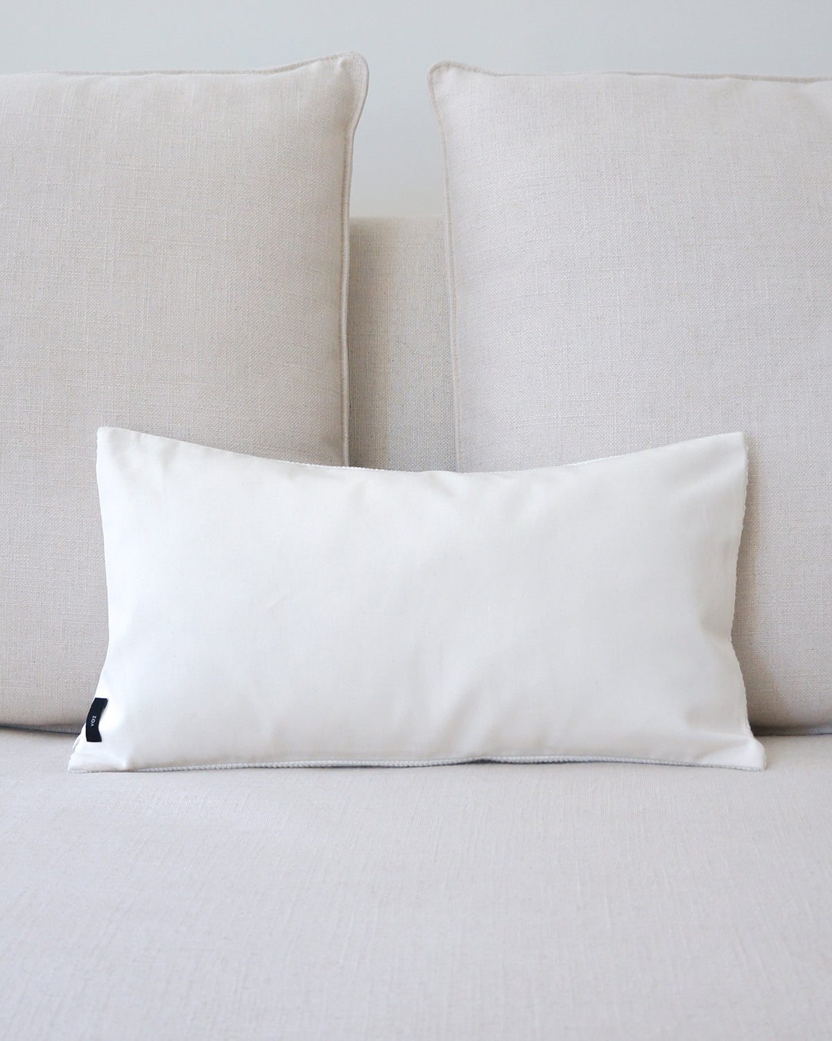 Solid Lumbar Pillow in Ivory Cotton